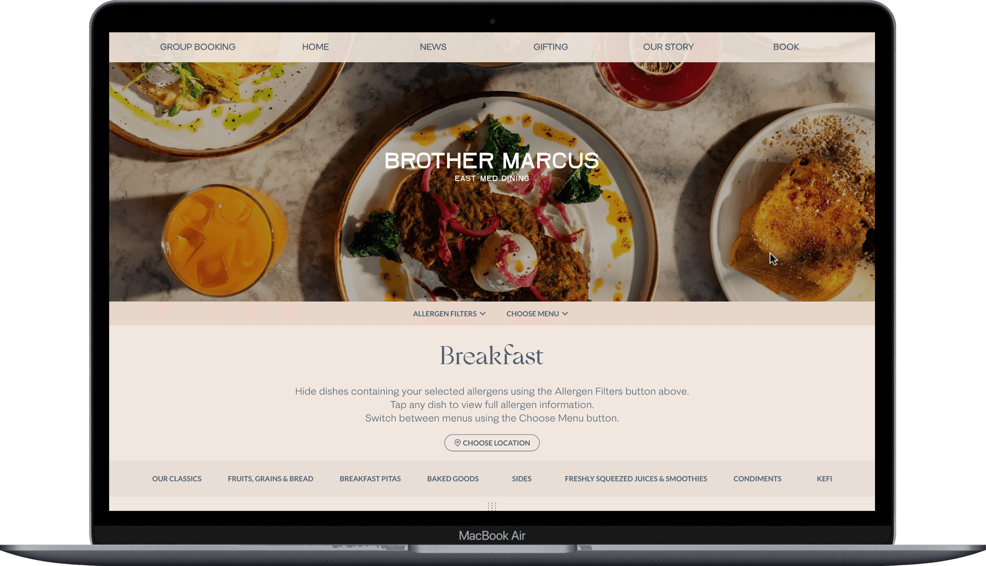 Published restaurant menu shown on a laptop